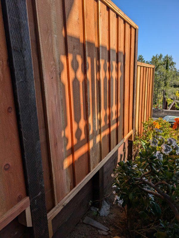 picture of a newly installed wooden fence 